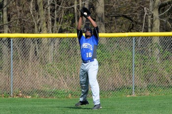 Academy Park's Tamir Ware, here catching a fly ball against Interboro Tuesday, is near the county lead with five doubles this season. (Times Staff/TOM KELLY IV)